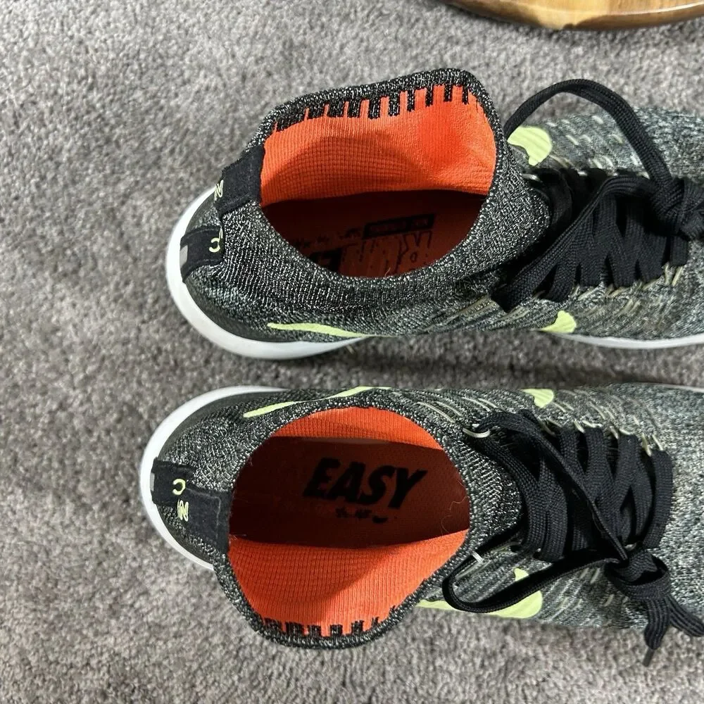 Nike Lunar Epic Flyknit 818676-015 Men's Size 9.5 Black Neon Athletic Shoes Used